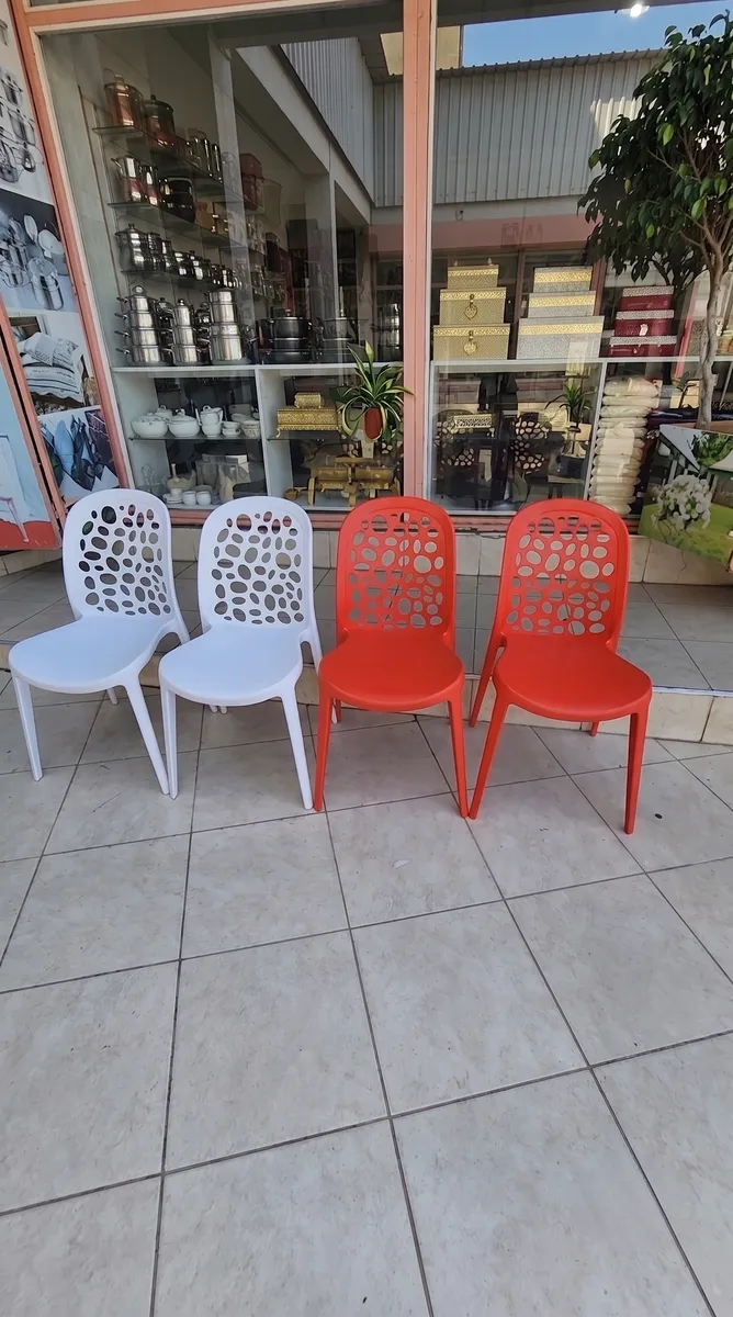 Plastic spider chair with distinctive cutout design